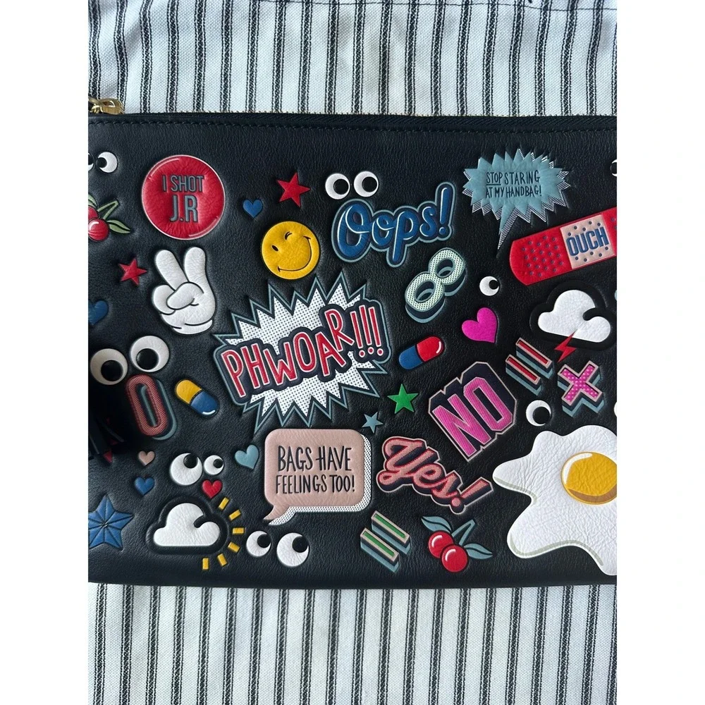 Anya Hindmarch Georgiana All Over Wink Sticker Clutch Bag with Tassel